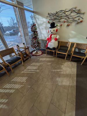 The lobby at 8AM this morning, they offered him their first available appointment on Friday when he had time.