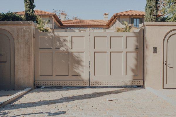 Custom dual sided vehicle electric gate