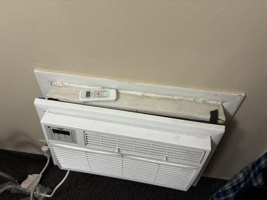 AC unit worked, but was falling out of the wall.
