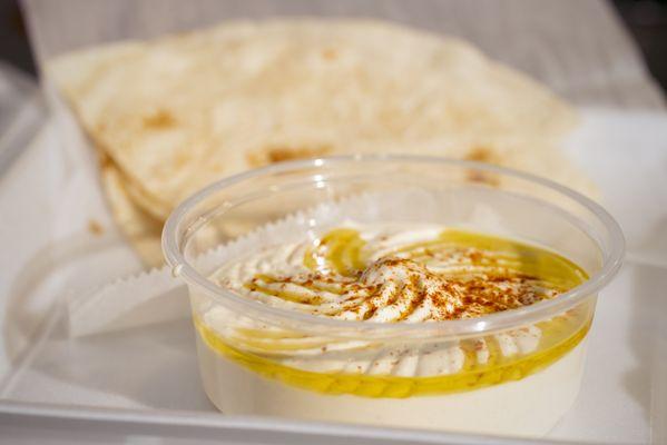 HUMMUS (Small)- Blended chickpeas with fresh lemon juice and Tahini (sesame paste), whipped to smooth, creamy perfection.