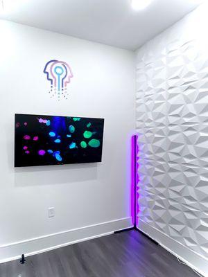 We named this room Nirvana, because it's pure bliss. We've equipped it with vibrant colors, headphones, aromatherapy, and a massage chair.