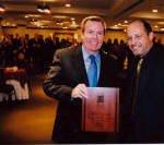 Getting Legislator of the year award from RITLA President