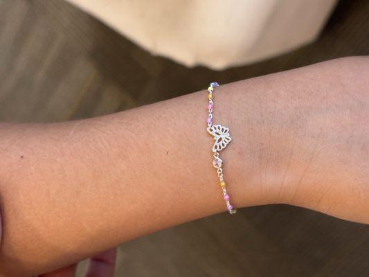Daughter's pastel bracelet with butterfly and birthstone connectors