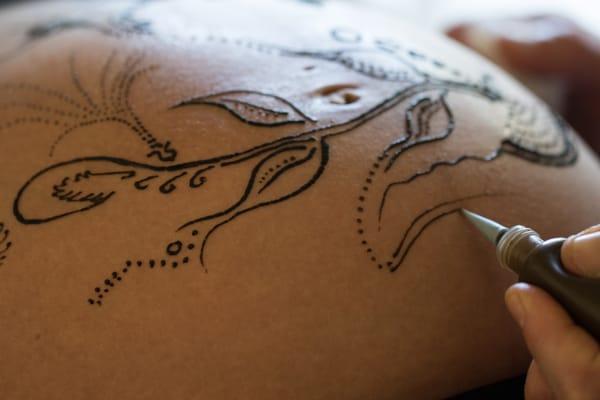 As the lines and images are placed, the information is being given about the baby and life to come. A special session for Mother and Baby.