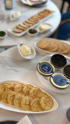 Caviar , crème fresh, tiny pancakes, butter.