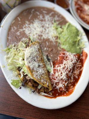 The two combo meal -one crispy taco and a cheese enchilada