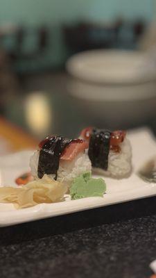 Tuna nigiri. Not overly fishy. Tip - only eat half the rice and make it a perfectly balanced bite.