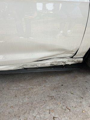 Damage from hitting a high curb.