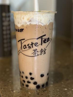 Classic Milk Tea & boba with Mustache Foam? I forget what it's called, but it's delicious!