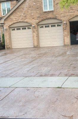 Power washed & re-sealed stamped concrete driveway!