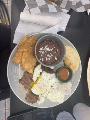 Carne Asada, eggs, chips, black beans