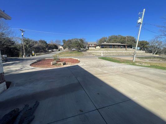 This is after their clean up.  Driveway clean, small branches and twigs all picked up.