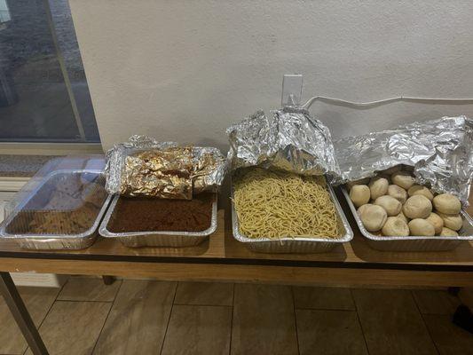 Spaghetti.. sauce ... rolls ... chocolate chip cookies