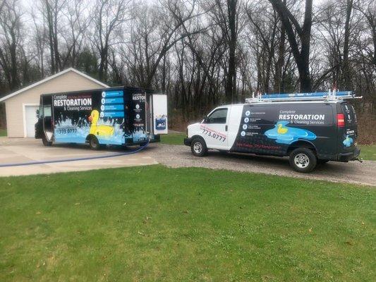 Two of the vehicles in our fleet.