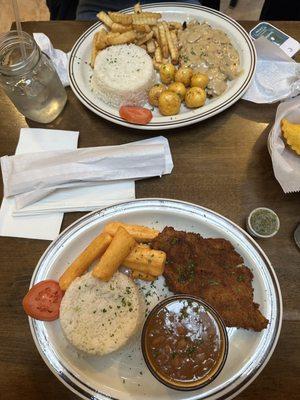 Milanesa de Pollo Pechuga en Champiñones Arroz (Rice) Papa Criolla (Yellow Potato) Yuca Frita (fried yucca)