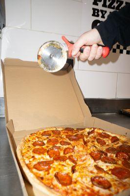 Large round pepperoni pizza