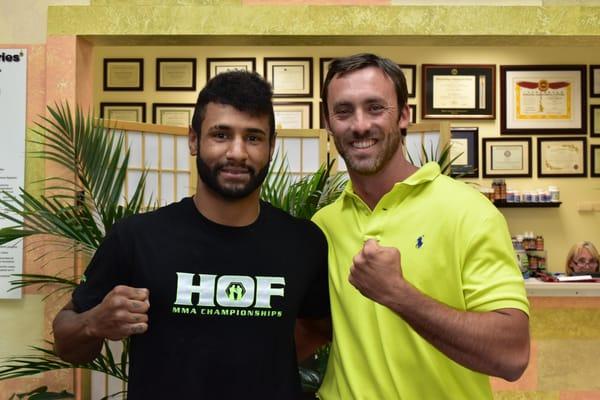 Dr. Walsh, New Smyrna Beach Chiropractor, with Mike Davis, professional MMA fighter.