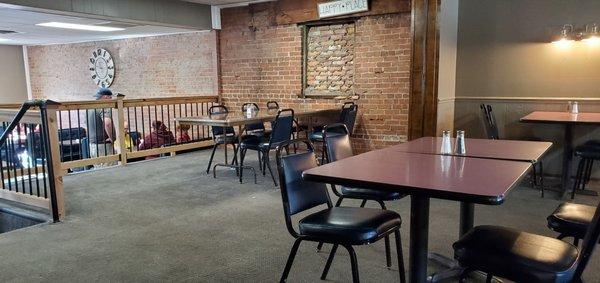 Renovated Seating area. Nicely distant tables.