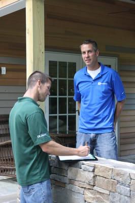 Burkholder - Owners Barry and Mark discuss details of a landscape project