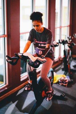 Below elbow amputee using an activity specific bike prosthetic