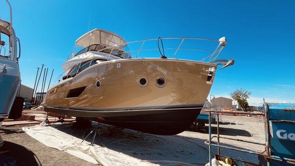 CHAZZZAM installed gold vinyl on the hull of my boat