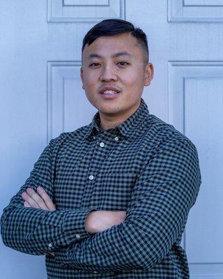 This is Johnny Lor. He'll be the one helping to do your taxes. Certified as an Enrolled Agent to do your taxes for the IRS.