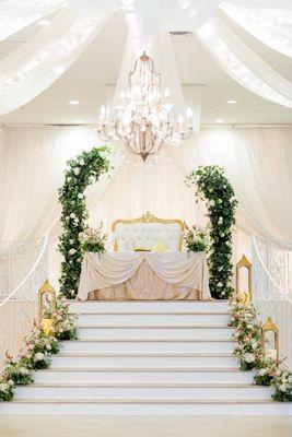 Setup for our sweethearts table. My florist did the pieces on the stairs separately (not included in GT package).