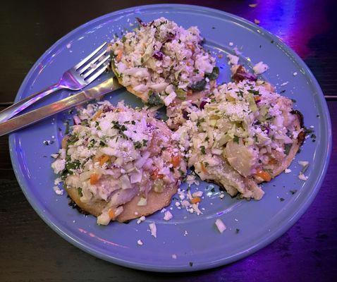 Chilled fish tacos of hand made corn tortillas.