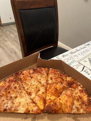 Just bread, no cheese no pepperoni nothing on it and it's burned on the enda