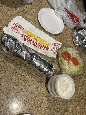 Large sub sandwich grinder, 3 ranch cups, salad, large garlic bread.