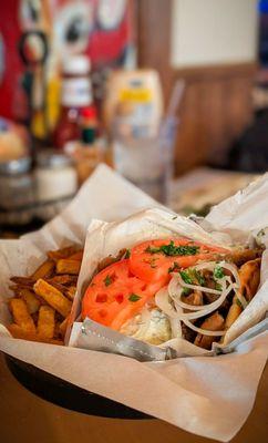 Gyros sandwich. Lighting a little funky, but you work with what you have.