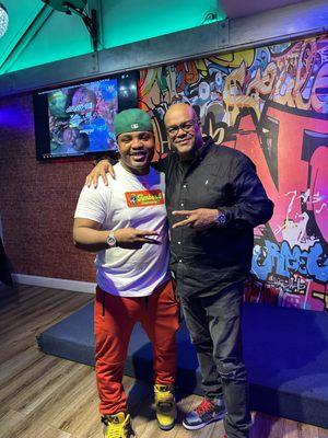 Comedian Diggs 2 Funny showing Timber 5 Dispensary some love wearing a Timber 5 tee shirt at a recent Amazing show.