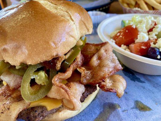 Cowboy Burger. Beef burger, bacon, jalapenos, cheddar cheese, BBQ sauce..... YUM!