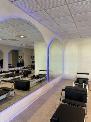 Beautiful large arched mirrors on every wall of the studio with ambiance lighting!