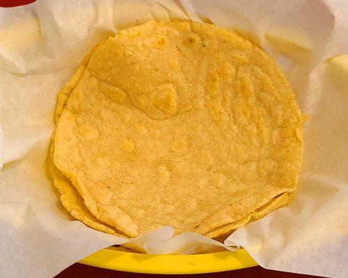 corn tortillas... soft and pliable. I thought they could have used a bit more time on the comal, personally. Seemed a bit raw)