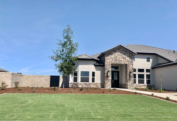 Landscaping is Extra, but several reasonable plans are available to fit your tastes.