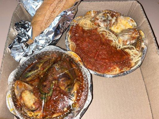 Mussels in fra diavolo sauce and spaghetti with meatball parm