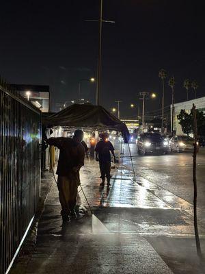 Cleaning store front for fresh curb appeal.