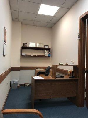 Simple office but the guy is heaven sent!