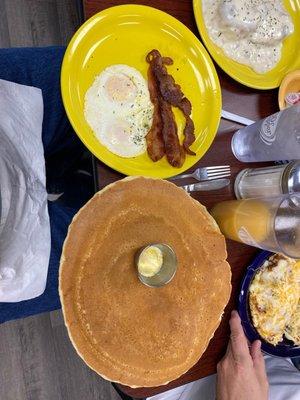 Pancakes bigger than the plate. This was the morning special.