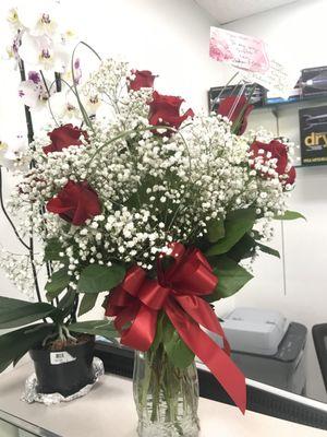 12 dozen long stem rose Mother's Day arrangement