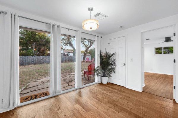 Painting of walls, trim, doors. Installed curtain rods.