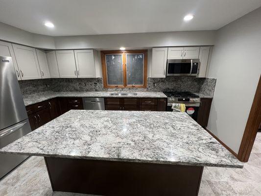 Granite Countertops with full height back splash