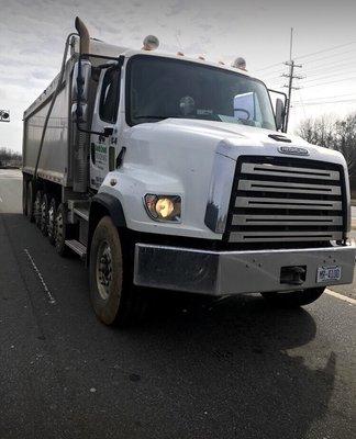 South Creek Trucking employee attempting to help his truck mate with the rear end of the vehicle in front of him, as per usual.