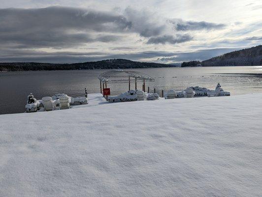 Lake Winnipesaukee highlighted by a beautiful snowy morning
