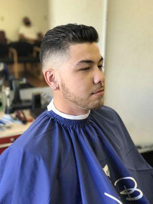 Bald fade textured pompadour