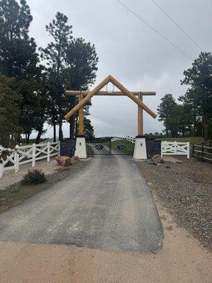 Log arch entrance
