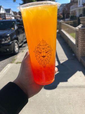 Mango green tea with some strawberry pop