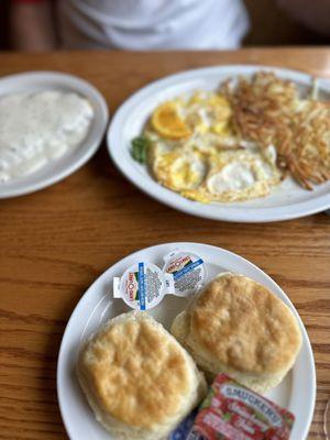 Hard fried eggs, hash browns and biscuits
