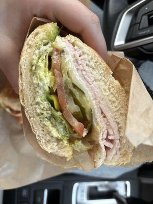 Smoked turkey sandwich with pesto on sourdough